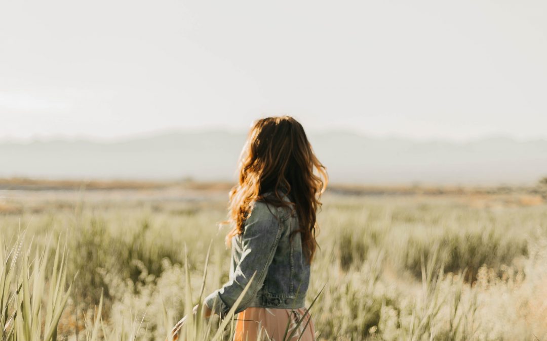 Woman standing in field