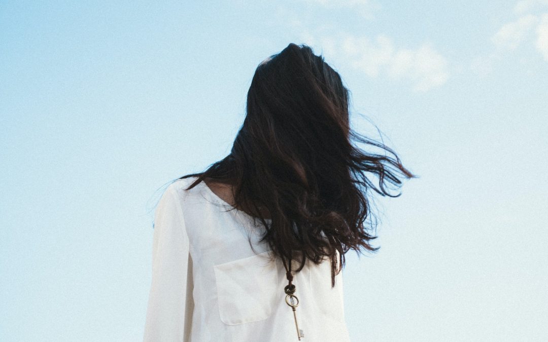 Woman hiding her face