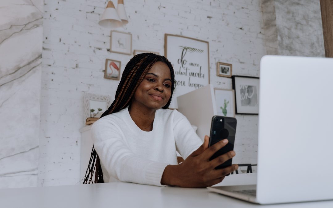 Happy woman on laptop